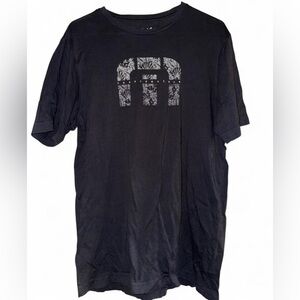 Travis Mathew Black Short-Sleeve Tee with Gray Tropical Logo